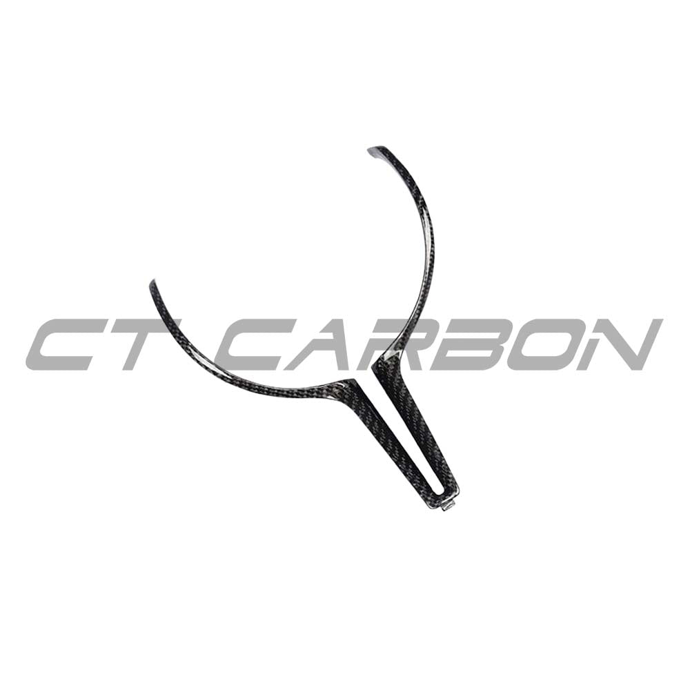 BMW M Fxx carbon fiber steering wheel trim accessory by CT Carbon, showcasing sleek, textured carbon fiber finish on the steering wheel.