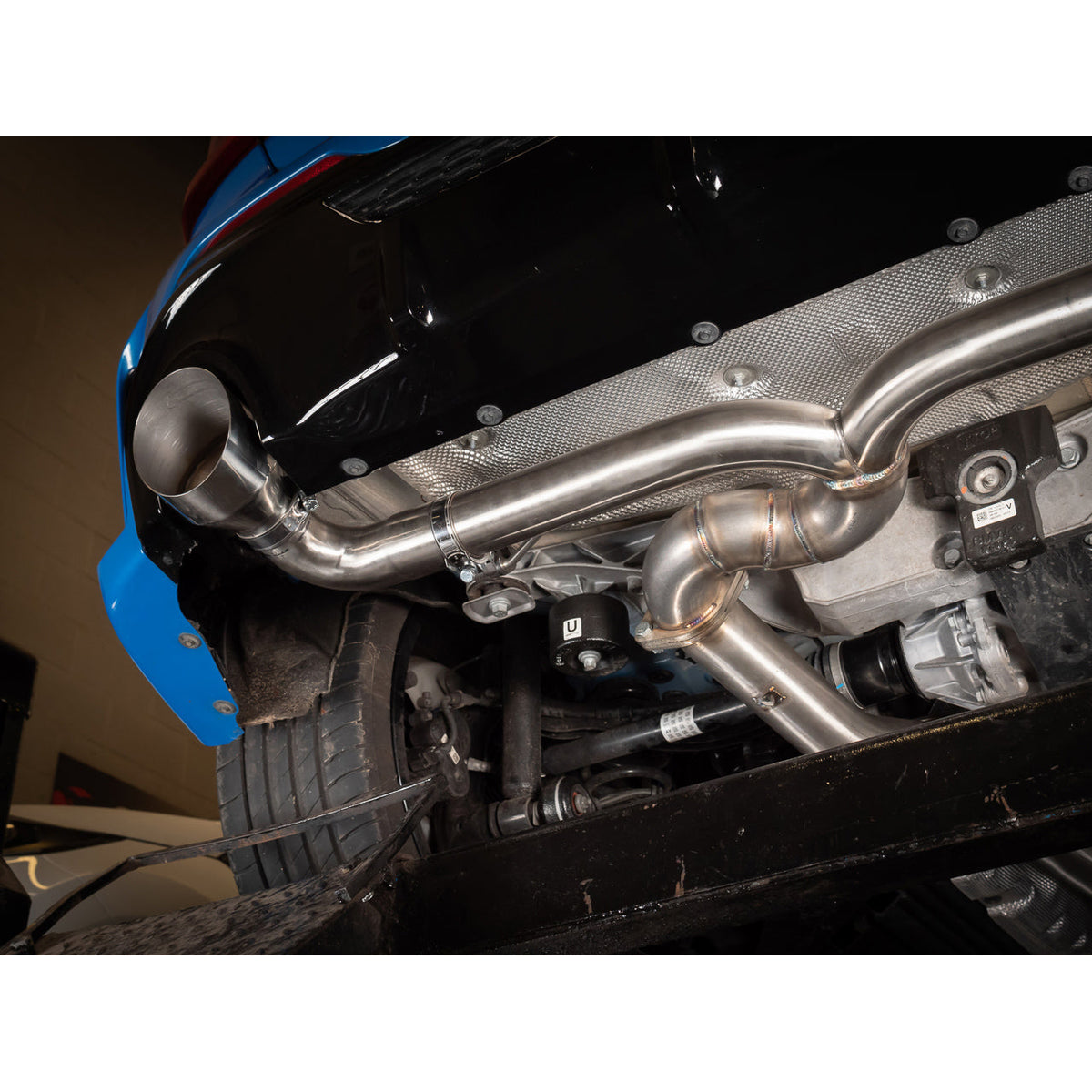 Cobra Sport BMW M135i F40 Venom Turbo Back Box Delete Race Exhaust with polished metal tips and sleek design.