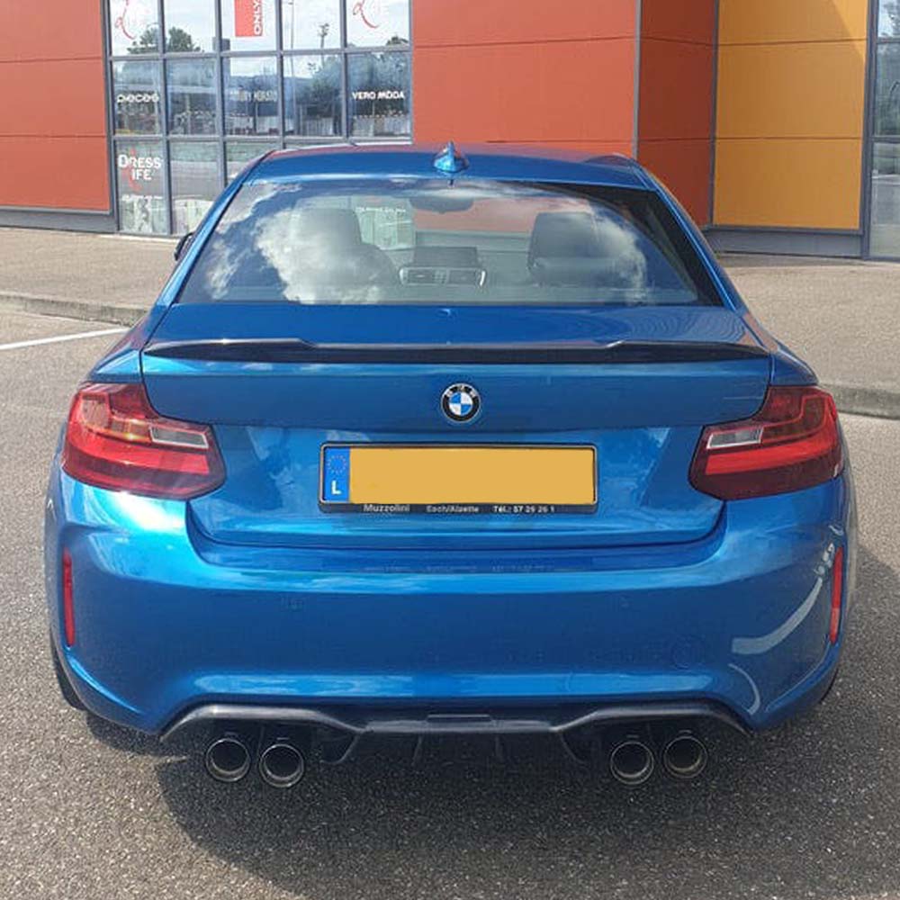BMW M2 F87 M2C F22 carbon fiber spoiler by CT Carbon, featuring a sleek CS-style design on a sporty car.