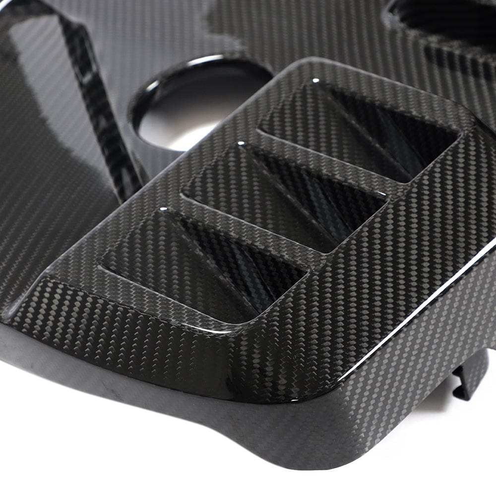 BMW M2, M3, M4 G87/G80/G81/G82/G83 carbon fiber engine cover by CT Carbon, showcasing sleek, lightweight car accessories.