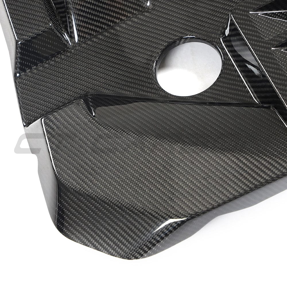 BMW M2 M3 M4 G87 G80 G81 G82 G83 Carbon Fibre Engine Cover by CT Carbon, showing sleek, lightweight engine cover detail.