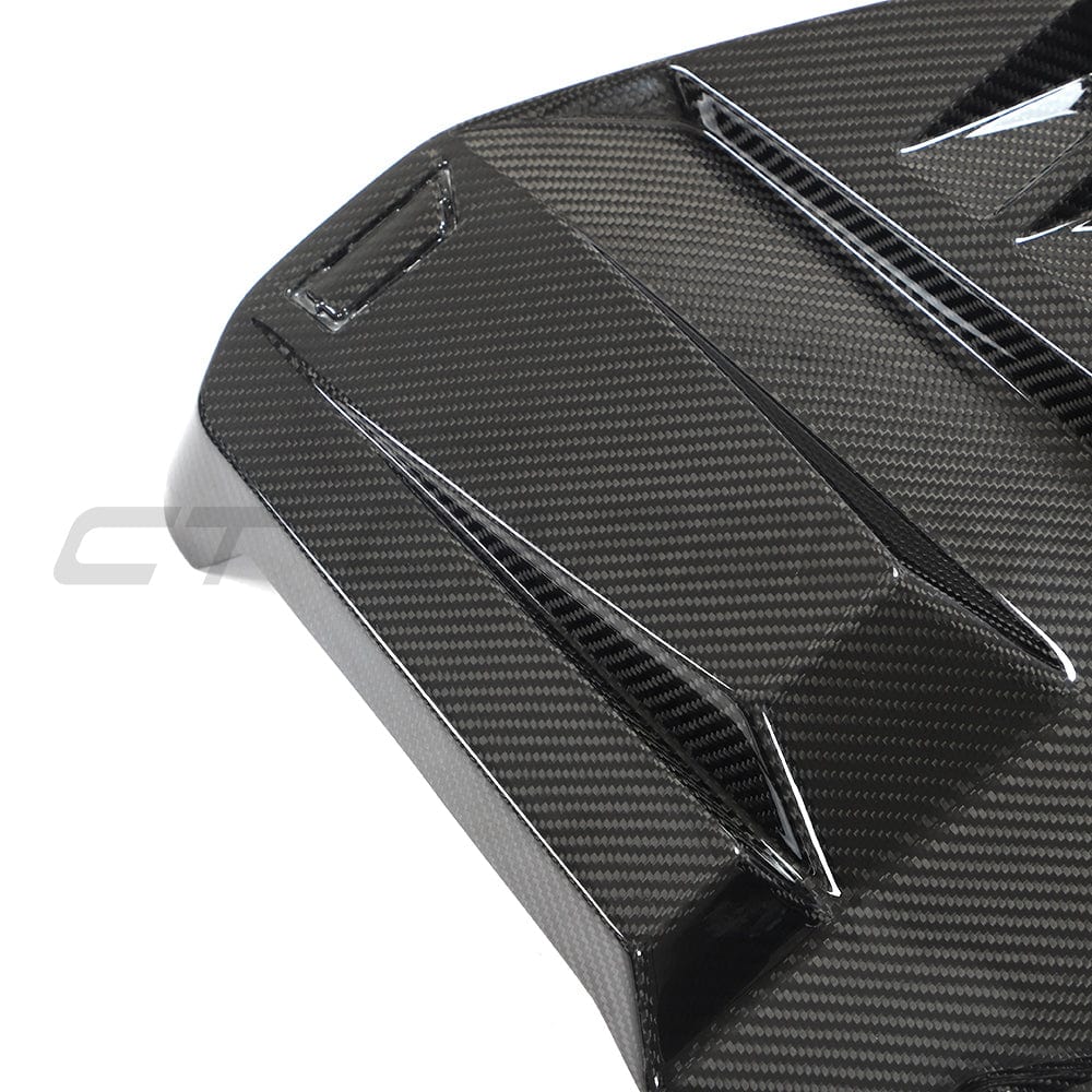 BMW M2 M3 M4 G87 G80 G81 G82 G83 carbon fiber engine cover by CT Carbon, showcasing sleek, lightweight automotive accessories.