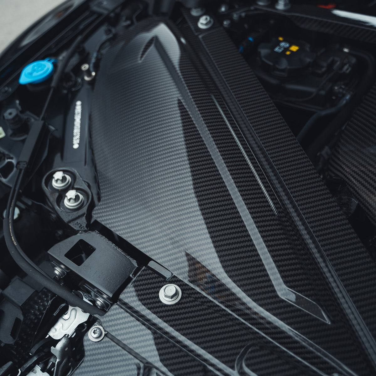 BMW M2, M3, M4 G87, G80, G81, G82, G83 Carbon Fibre Engine Dress Up Kit by CT Carbon, showing the sleek carbon fibre components.