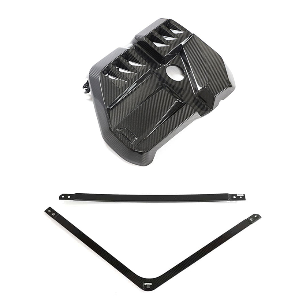 BMW M2, M3, M4 G87, G80, G81, G82, G83 Carbon Fibre Engine Dress Up Kit by CT Carbon, showing sleek carbon fiber surface on engine accessories.