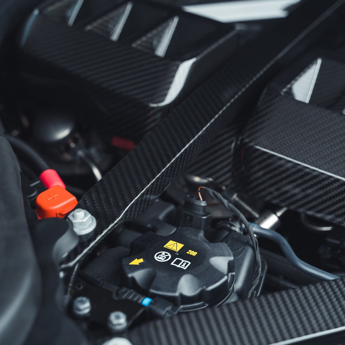 BMW M2 M3 M4 G87 G80 G81 G82 G83 Carbon Fibre Engine Strut Brace by CT Carbon, showing the lightweight, high-performance accessory.