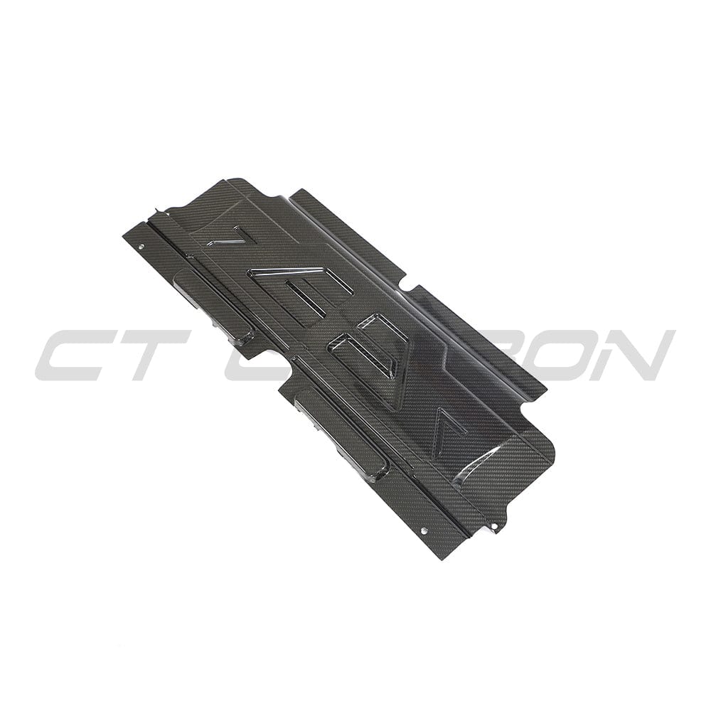 BMW M2 M3 M4 G87 G80 G81 G82 G83 Carbon Fibre Slam Panel Cover by CT Carbon, close-up view of sleek carbon fiber finish.