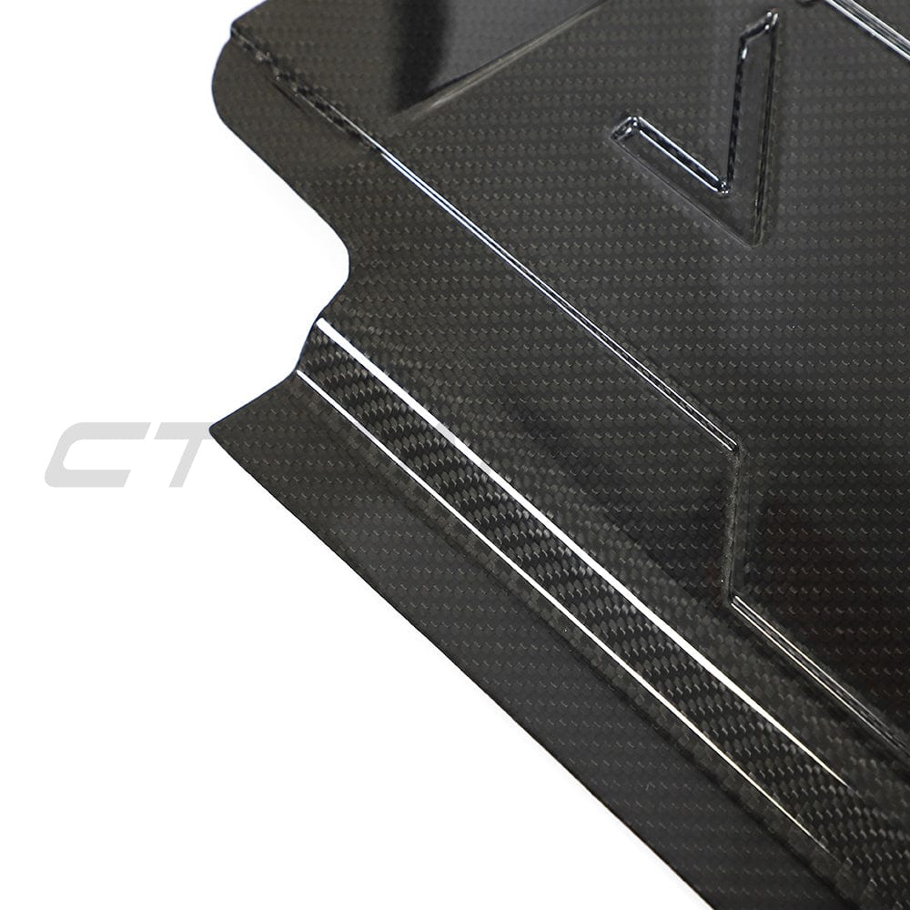 BMW M2, M3, M4 G87, G80, G81, G82, G83 carbon fibre slam panel cover by CT Carbon, showing the sleek lightweight accessory.
