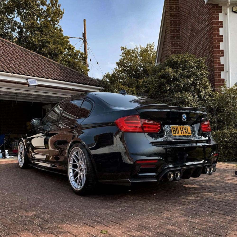 BMW M3 F80 & F30 3 Series carbon fibre spoiler by CT Carbon, V2 style, showing sleek aerodynamic design on the car.