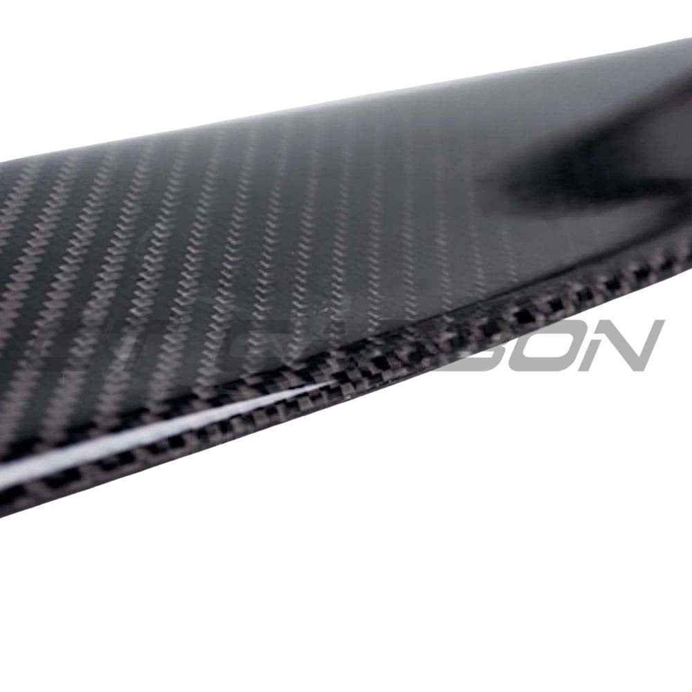BMW M3 F80 F30 carbon fibre spoiler by CT Carbon, showcasing its sleek, aerodynamic design on the car's rear.