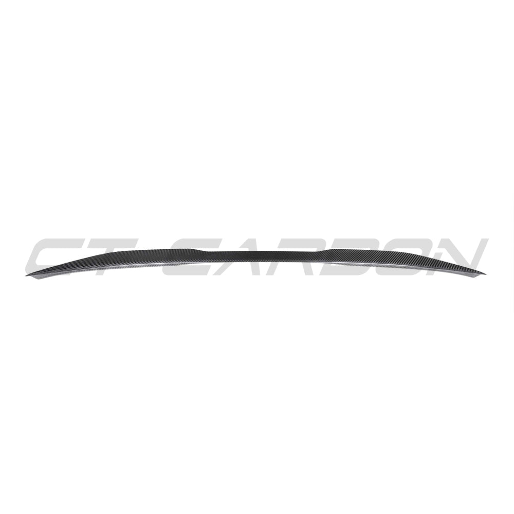 BMW M3 F80 and F30 3 Series CT Carbon pre-preg carbon fiber spoiler V2 installed on the car's rear for enhanced aerodynamics.