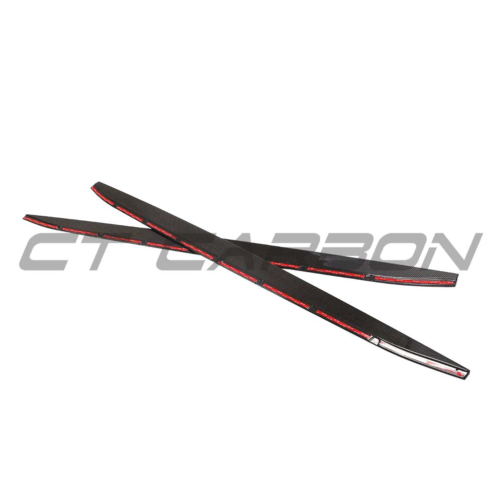 BMW G80 M3 carbon fiber side skirt extensions kit by CT Design, showcasing sleek, lightweight carbon fiber components on the car.