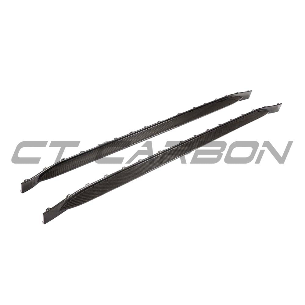 BMW G81 M3 carbon fibre side skirt replacement kit by CT Design, showcasing sleek, lightweight carbon fibre panels on the car.