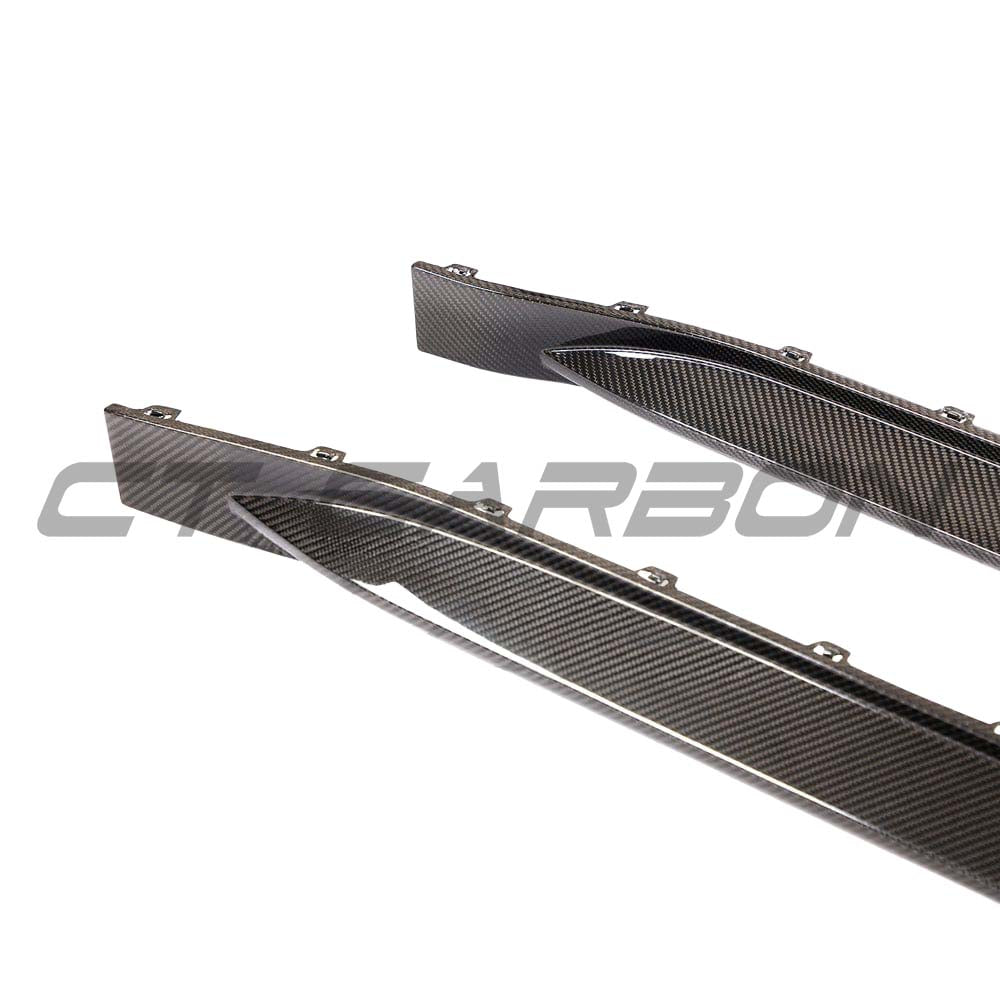 BMW G81 M3 CT Design carbon fibre side skirt replacement kit, showcasing sleek, lightweight side panels with a textured finish.