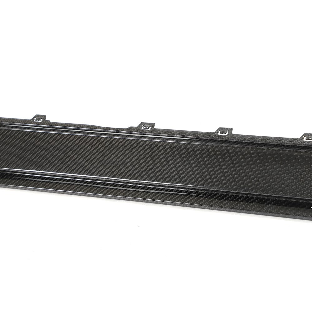 BMW M3 G80 G81 carbon fibre side skirt replacement by CT Design, showcasing sleek, lightweight, and aerodynamic side skirt detail.