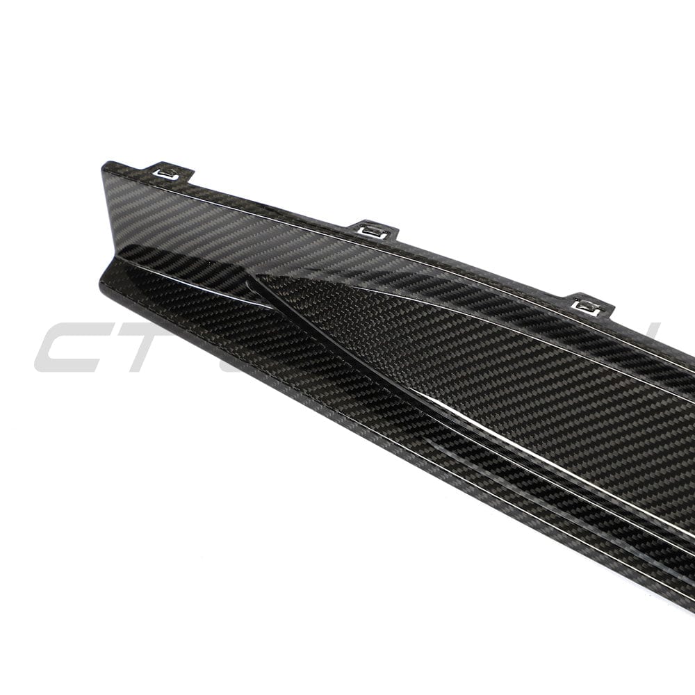 BMW M3 G80 G81 carbon fibre side skirt replacement by CT Carbon, featuring sleek V2 design, shown on the car for enhanced style.