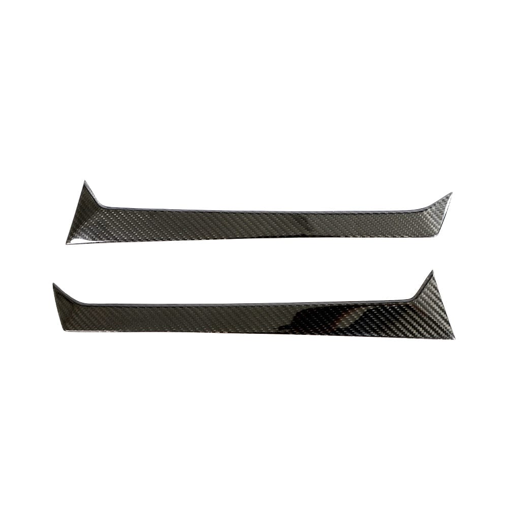 BMW M3 G81 carbon fibre rear window trim accessory by CT Carbon, showcasing sleek, textured carbon fibre design on the car window.