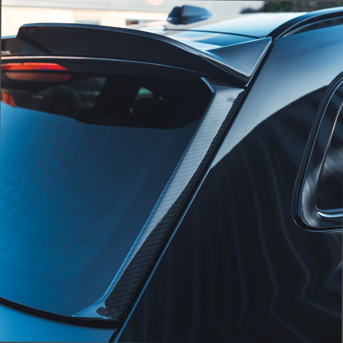 BMW M3 G81 G21 carbon fibre spoiler by CT Design, showing sleek aerodynamic design and glossy carbon finish.