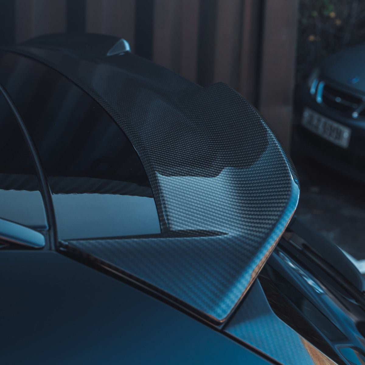 BMW M3 G81 carbon fibre spoiler from CT Design, showcasing sleek, aerodynamic design on a sporty car.