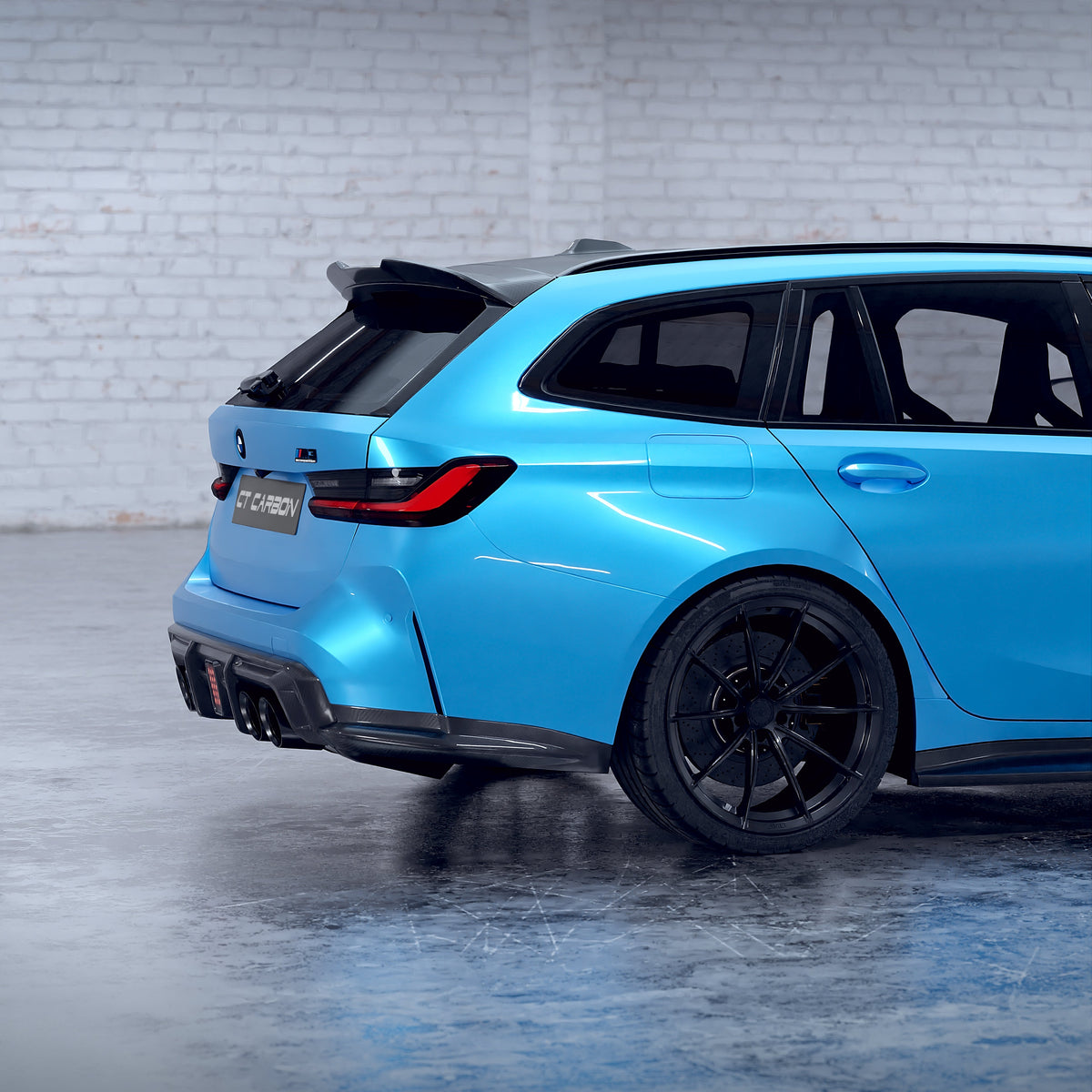 BMW M3 G81 G21 carbon fibre spoiler by CT Design, showcasing sleek aerodynamic design and glossy black finish.