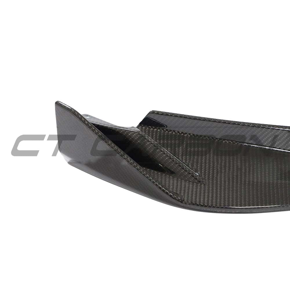 BMW G80 M3 full carbon fibre kit from CT Carbon, featuring aerodynamic splitter and sleek carbon fibre components.
