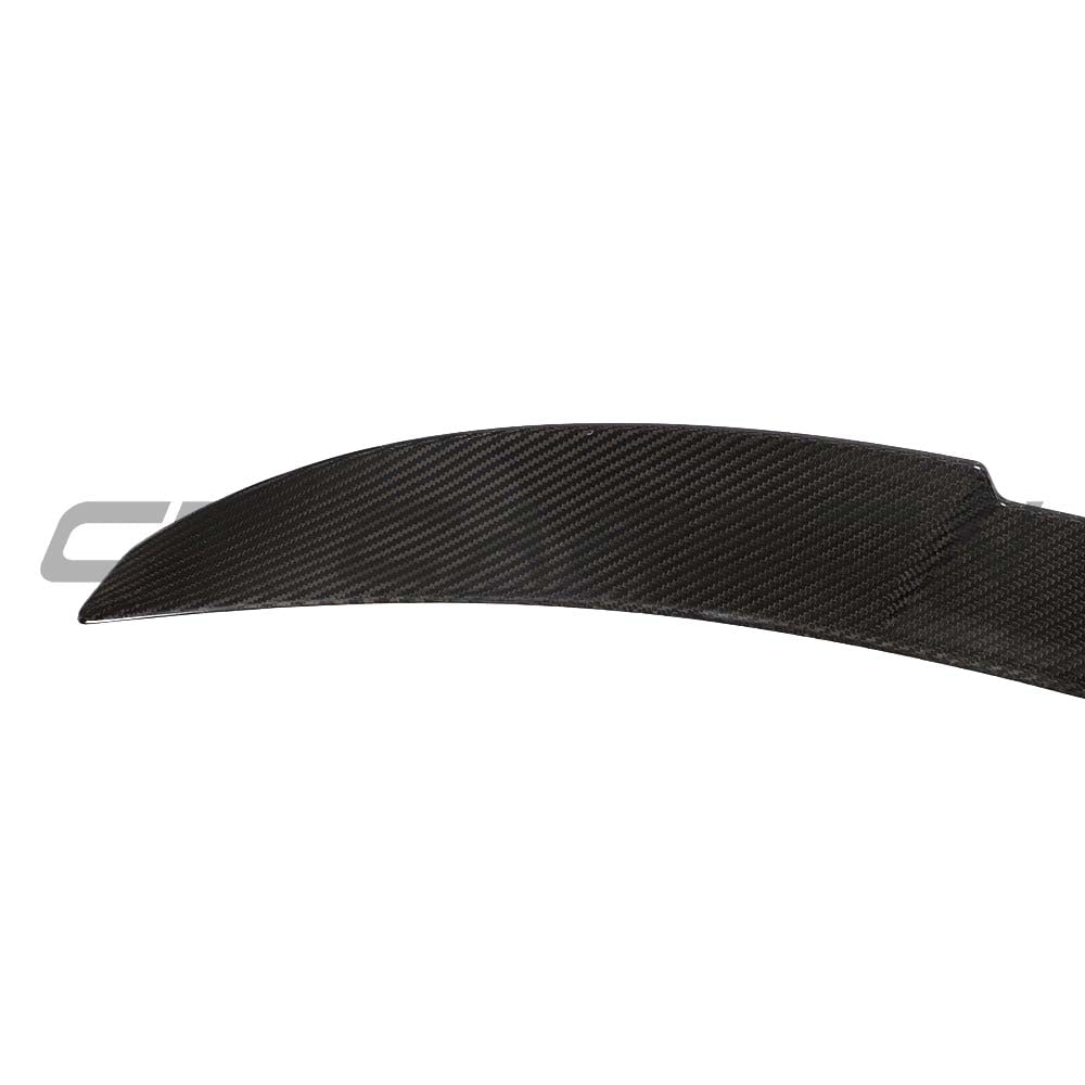 BMW M3 G80 G20 carbon fibre spoiler by CT Design, showcasing sleek aerodynamic design on a sporty car.