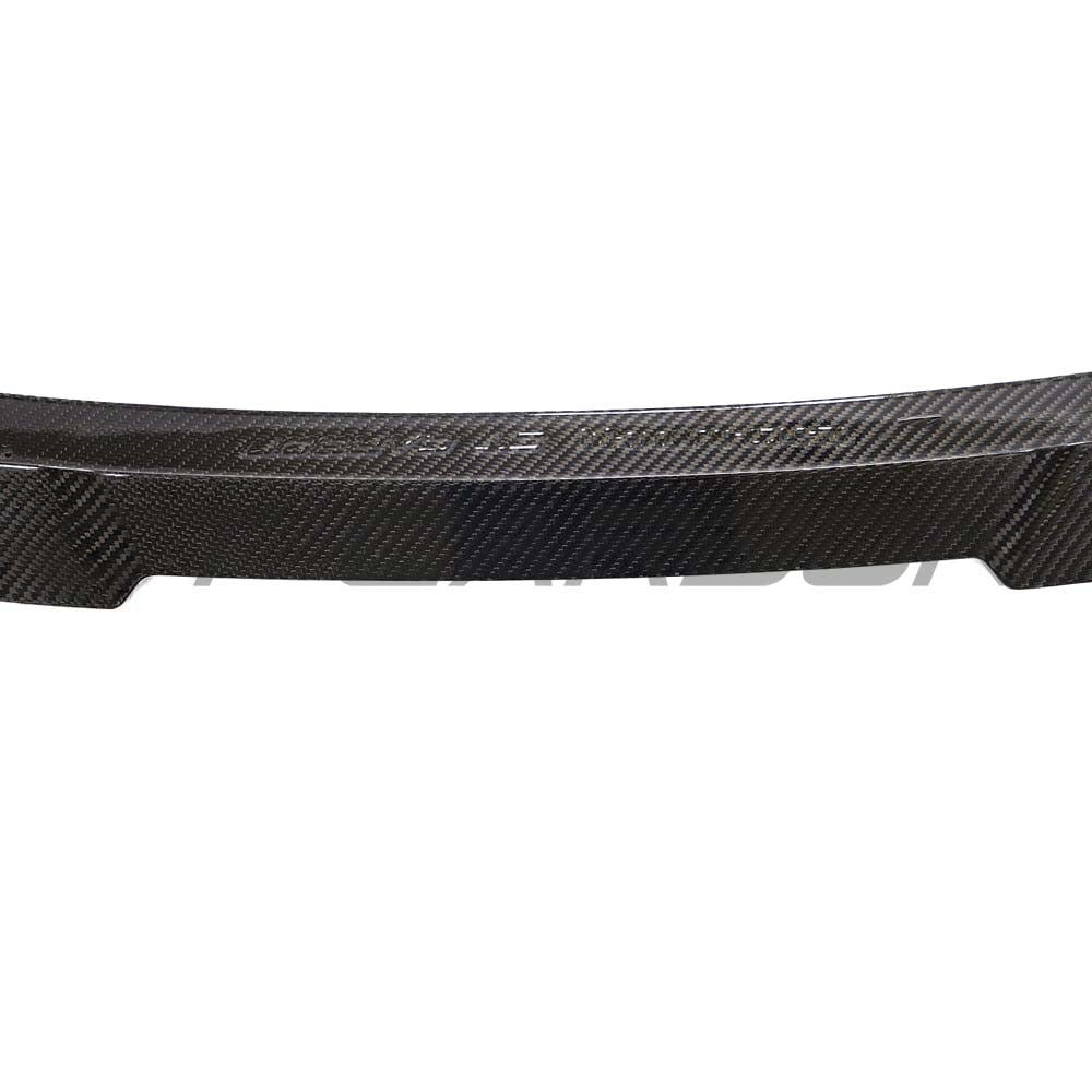 BMW M3 G80 G20 carbon fibre spoiler by CT Design, showcasing sleek aerodynamic design on a sporty car.