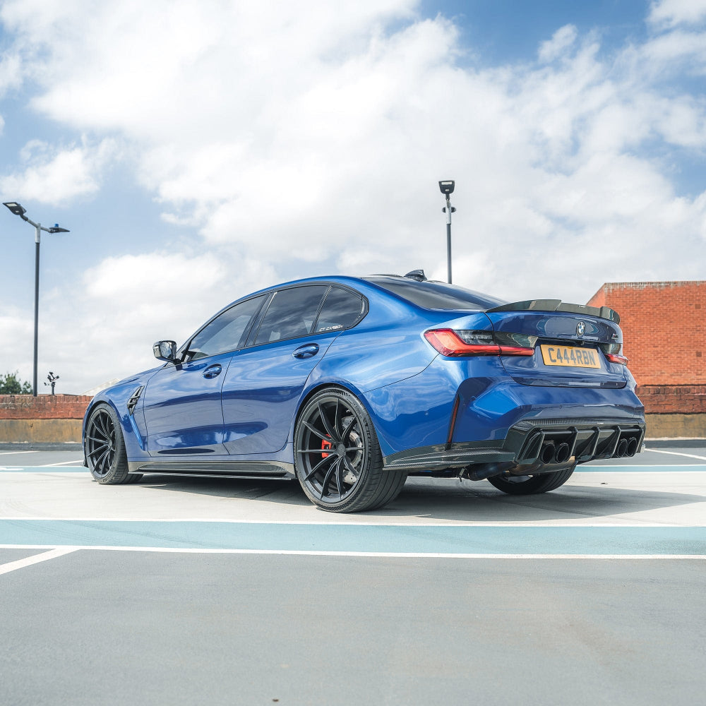 BMW M3 G80 G20 carbon fibre spoiler by CT Design, showcasing the sleek, aerodynamic design on the car's rear.