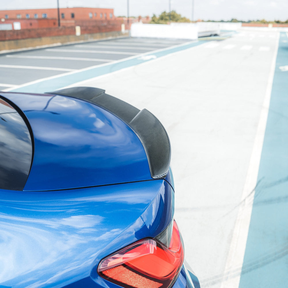 BMW M3 G80 G20 carbon fibre spoiler by CT Design, showcasing sleek aerodynamic design on a sporty vehicle.