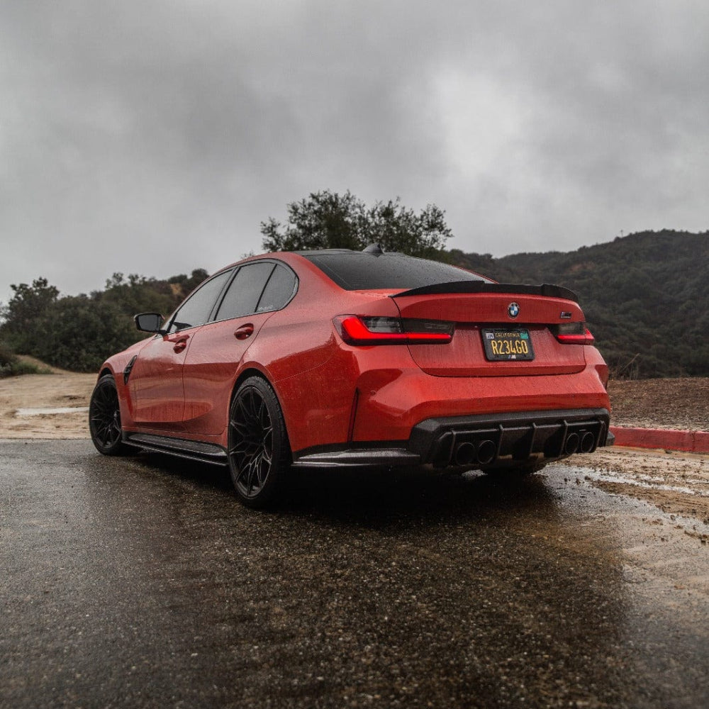 BMW M3 G80 G20 carbon fibre spoiler by CT Design, showcasing sleek aerodynamic design on the car's rear.