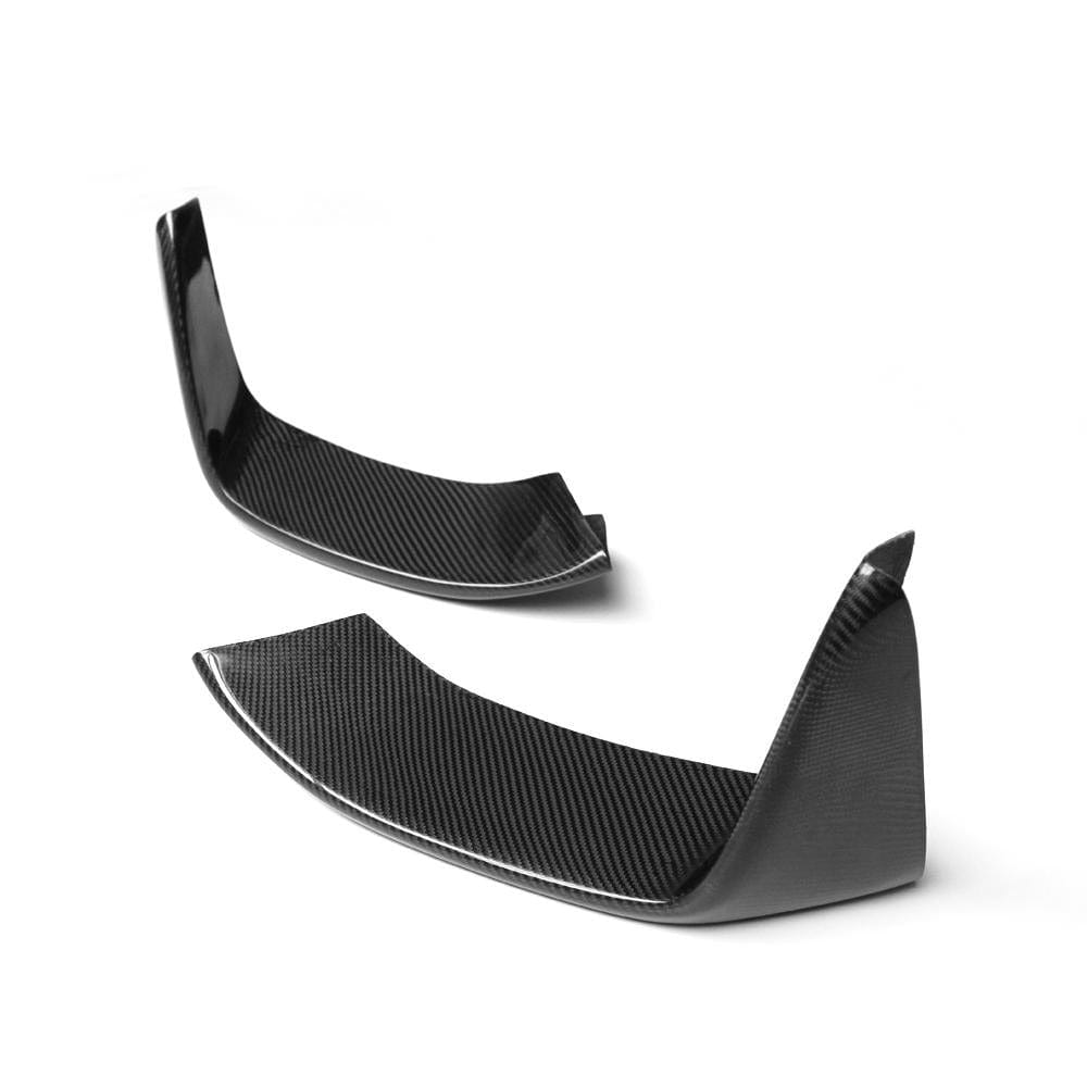 BMW M3 M4 F80 F82 F83 carbon canards and splitter by CT Carbon, showing a close-up of the aerodynamic front splitter.