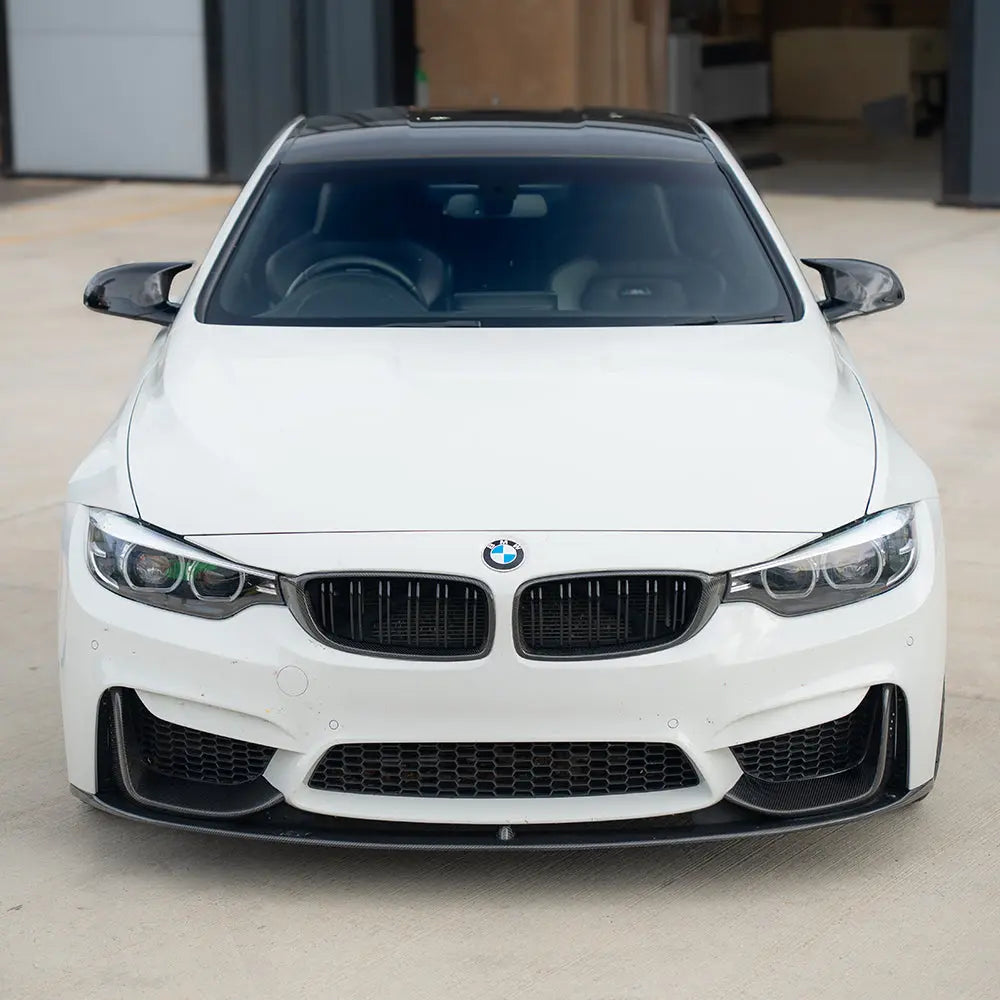 BMW M3 M4 F80 F82 F83 carbon fiber splitter set, three-piece front grille splitters for improved aerodynamics.