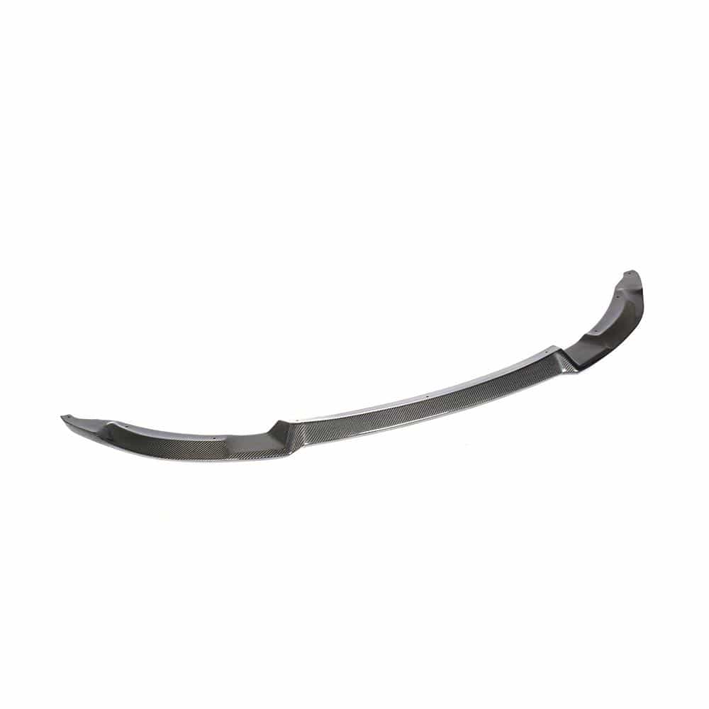 BMW M3 M4 F80 F82 F83 carbon fibre splitter by CT Carbon, V2, showing sleek aerodynamic design on the car's front bumper.