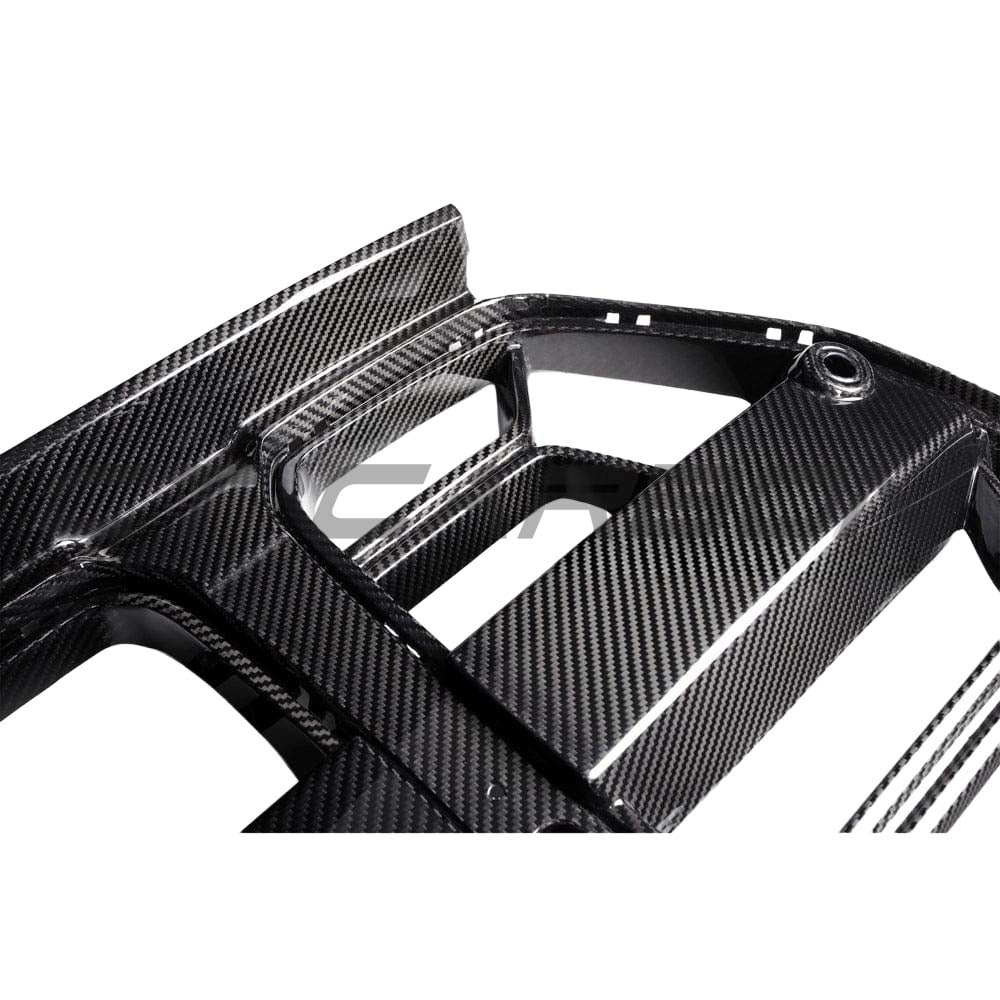 BMW M3 M4 G80 G82 G83 carbon fibre grille by CT Carbon with ACC, showcasing sleek black finish and aerodynamic design.