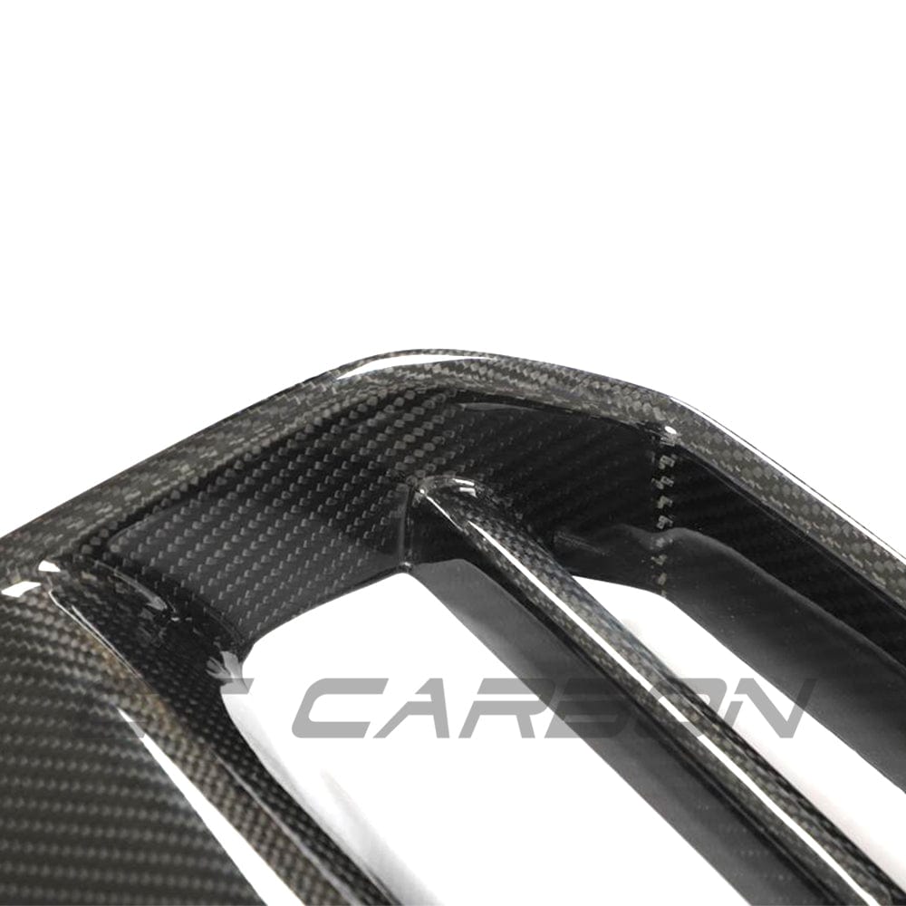 BMW M3 M4 G80 G81 G82 G83 carbon fiber grille by CT Carbon, showcasing sleek GT-style design without accessories.