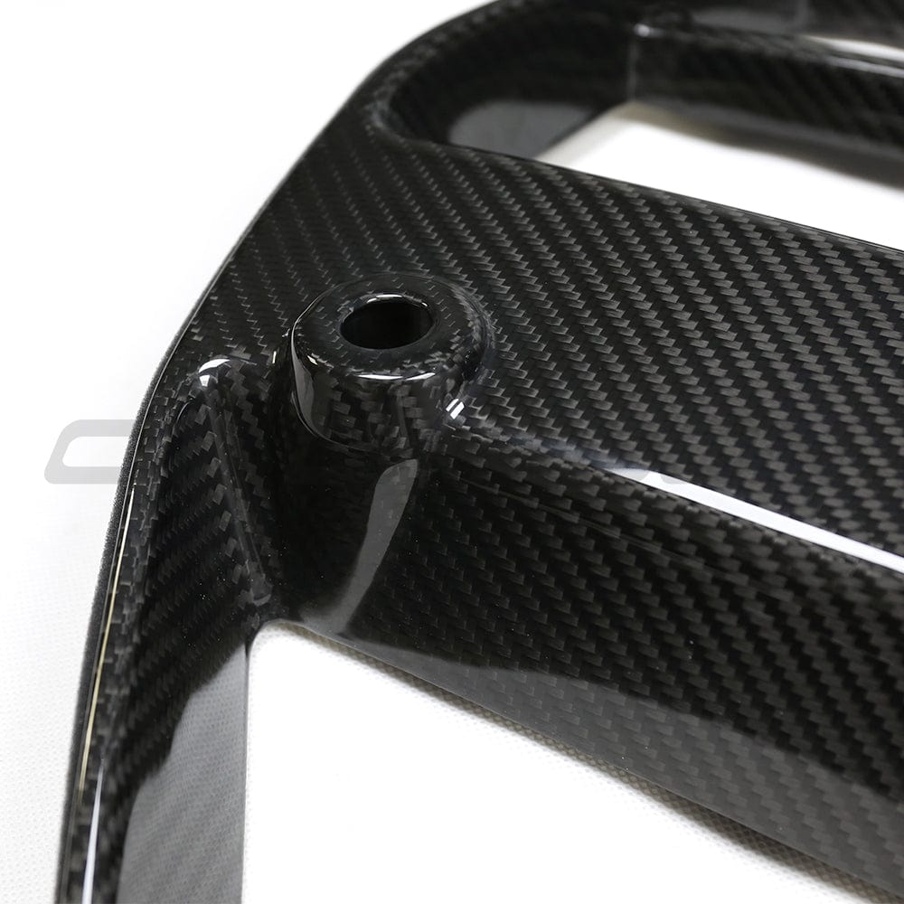 BMW M3 M4 G80 G82 G83 carbon fibre grille by CT Carbon, front view showing sleek, lightweight grille design without accessories.