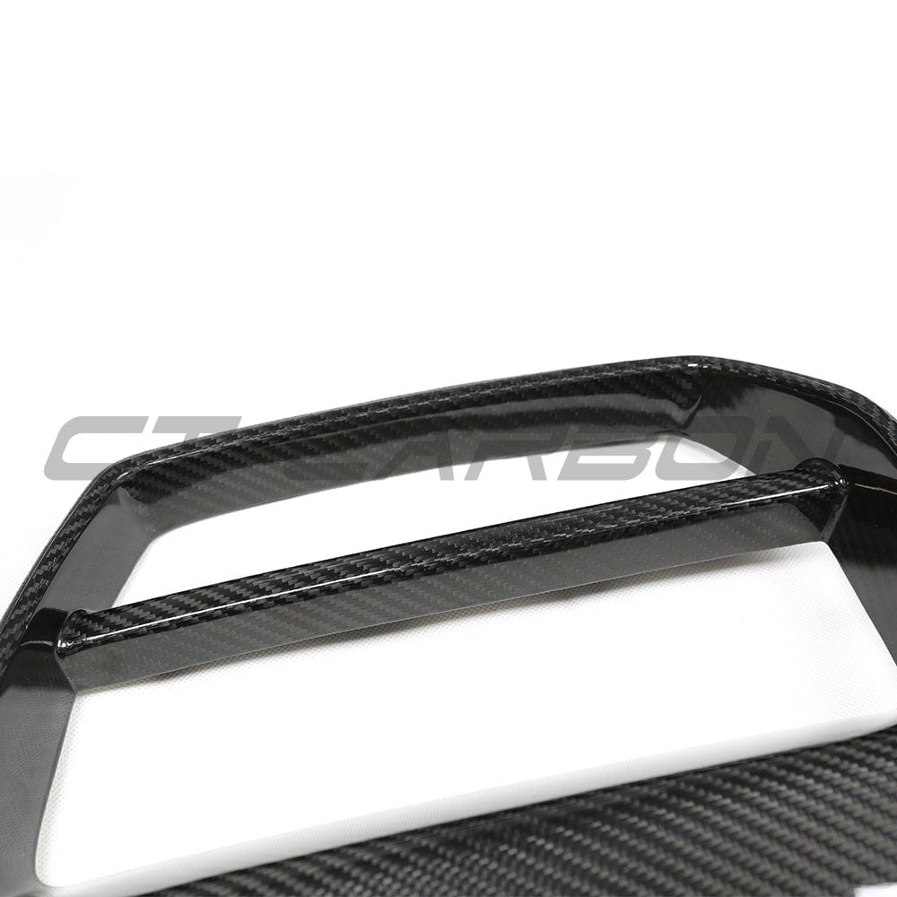 BMW M3 M4 G80 G82 G83 carbon fibre grille by CT Carbon, showcasing sleek, lightweight grille design without accessories.