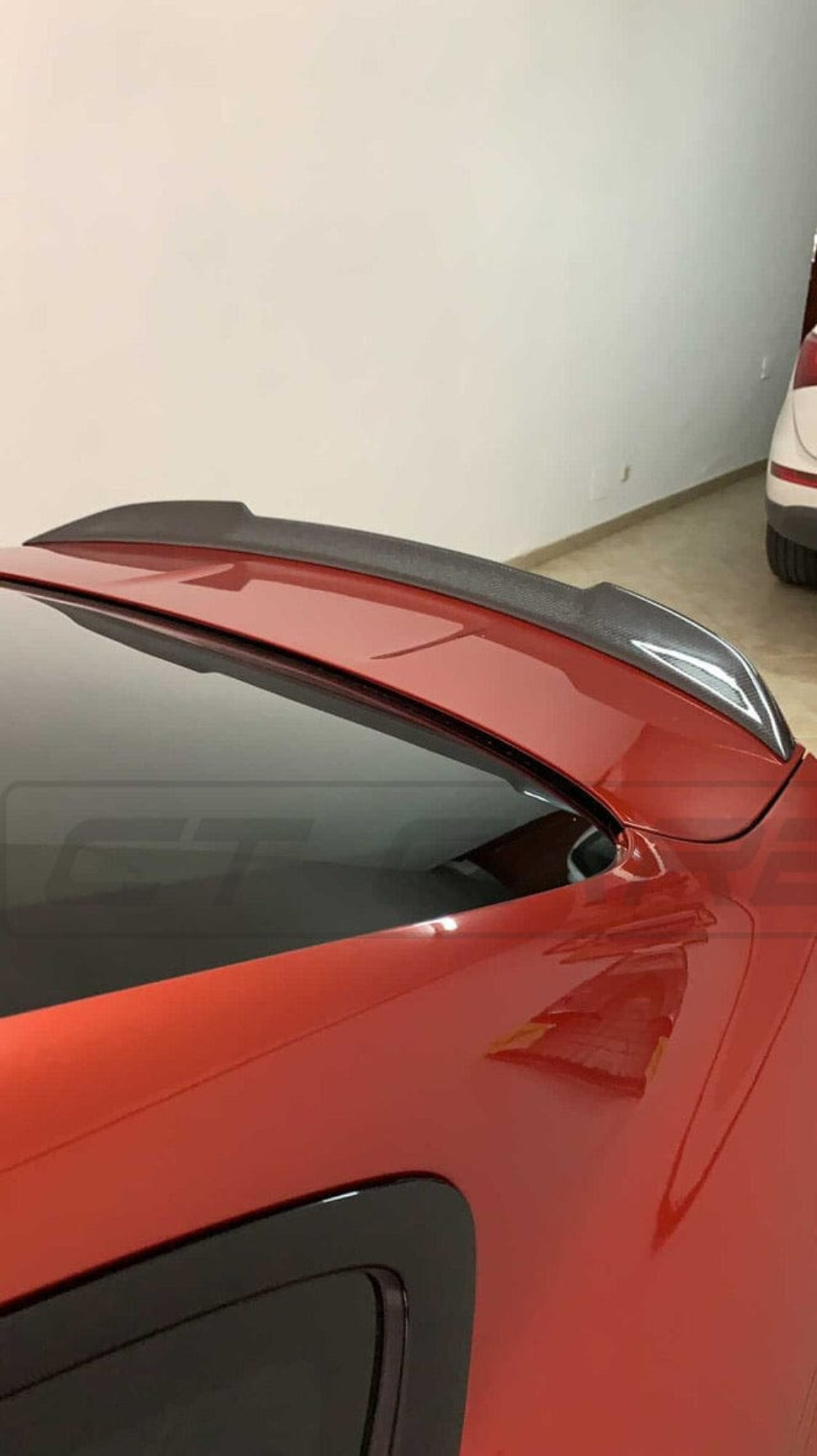 BMW M4 F82 carbon fibre spoiler in CS style by CT Carbon, showing the sleek, lightweight aerodynamic design on the car.