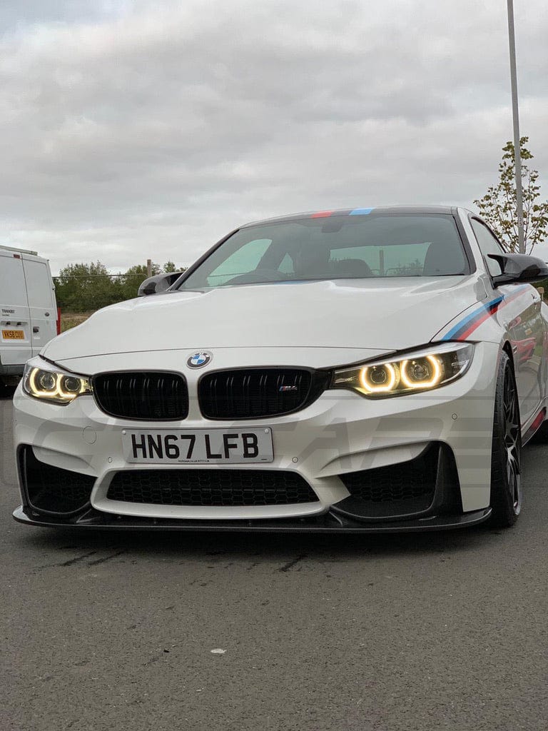BMW M4 F83 convertible full carbon fibre kit by CT Carbon, showing detailed carbon fibre components on the car.