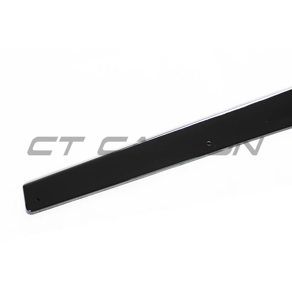 BMW M4 F83 convertible full gloss black kit by CT Carbon, showing the sleek, shiny exterior parts on the car.