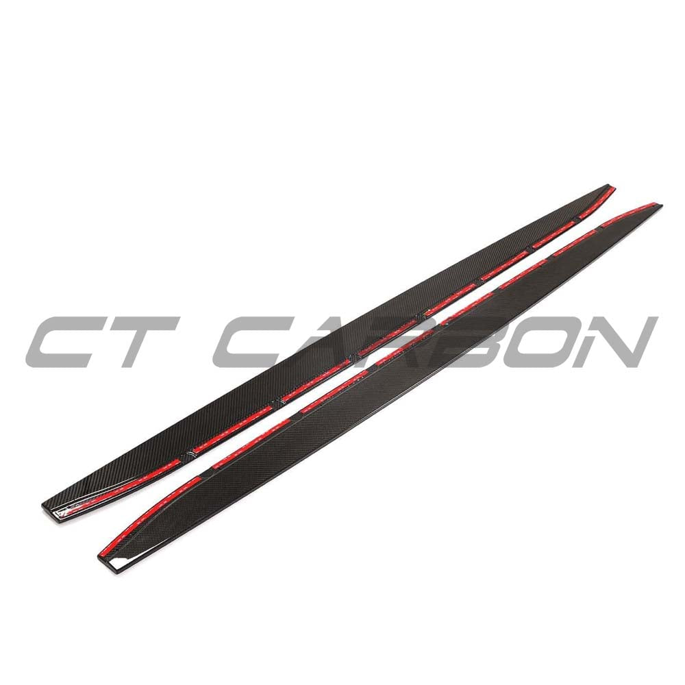BMW G82 M4 full carbon fibre side skirt extensions kit by CT Design, showcasing sleek, lightweight carbon fibre details on a sports car.
