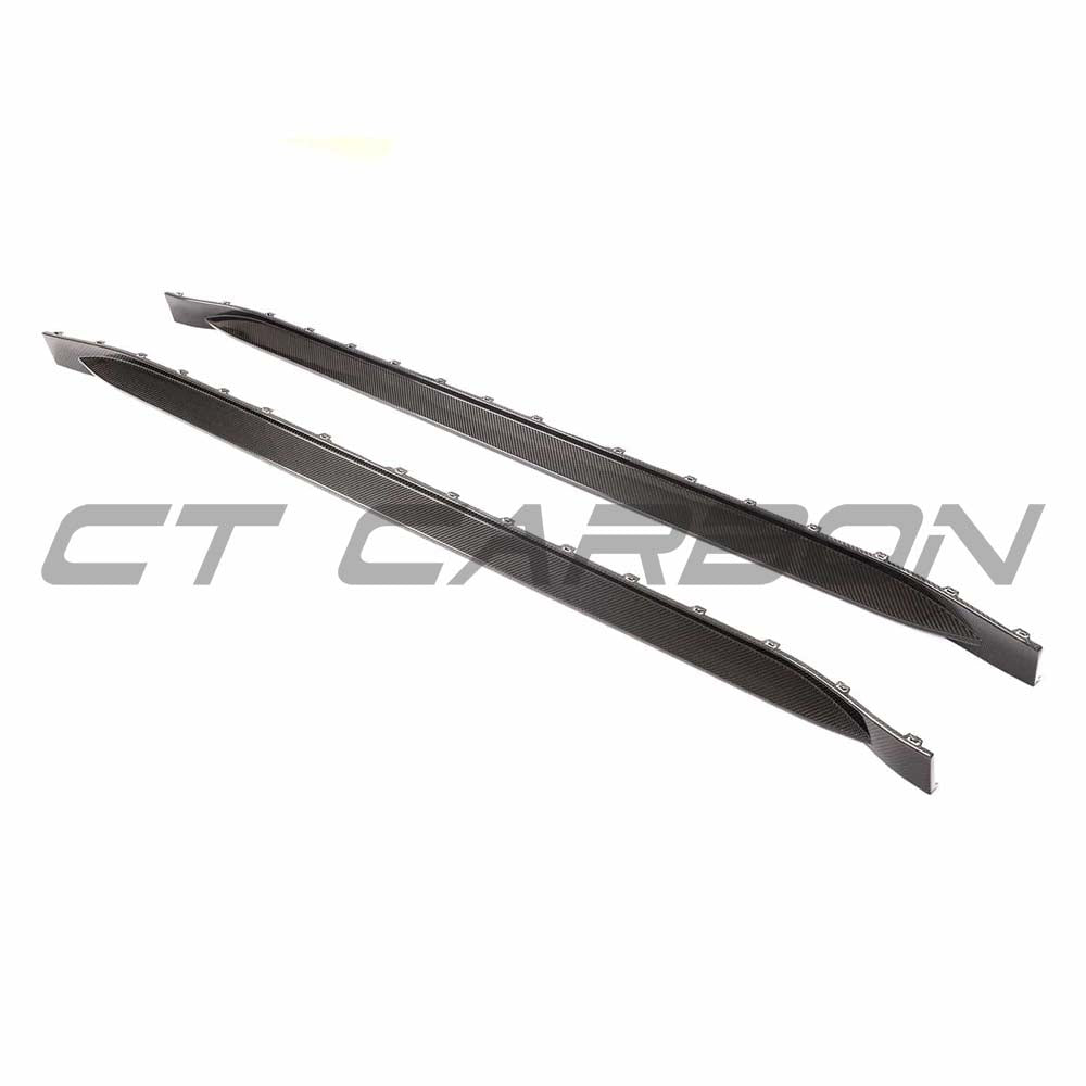 BMW G82 M4 full carbon fiber kit by CT Design, featuring side skirts and aerodynamic components on a sleek sportscar.
