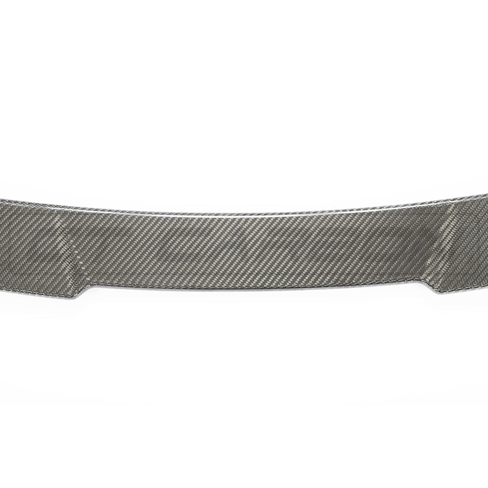 BMW M4 G83 full carbon fibre kit by CT Carbon, featuring sleek carbon fibre components on a sports car.