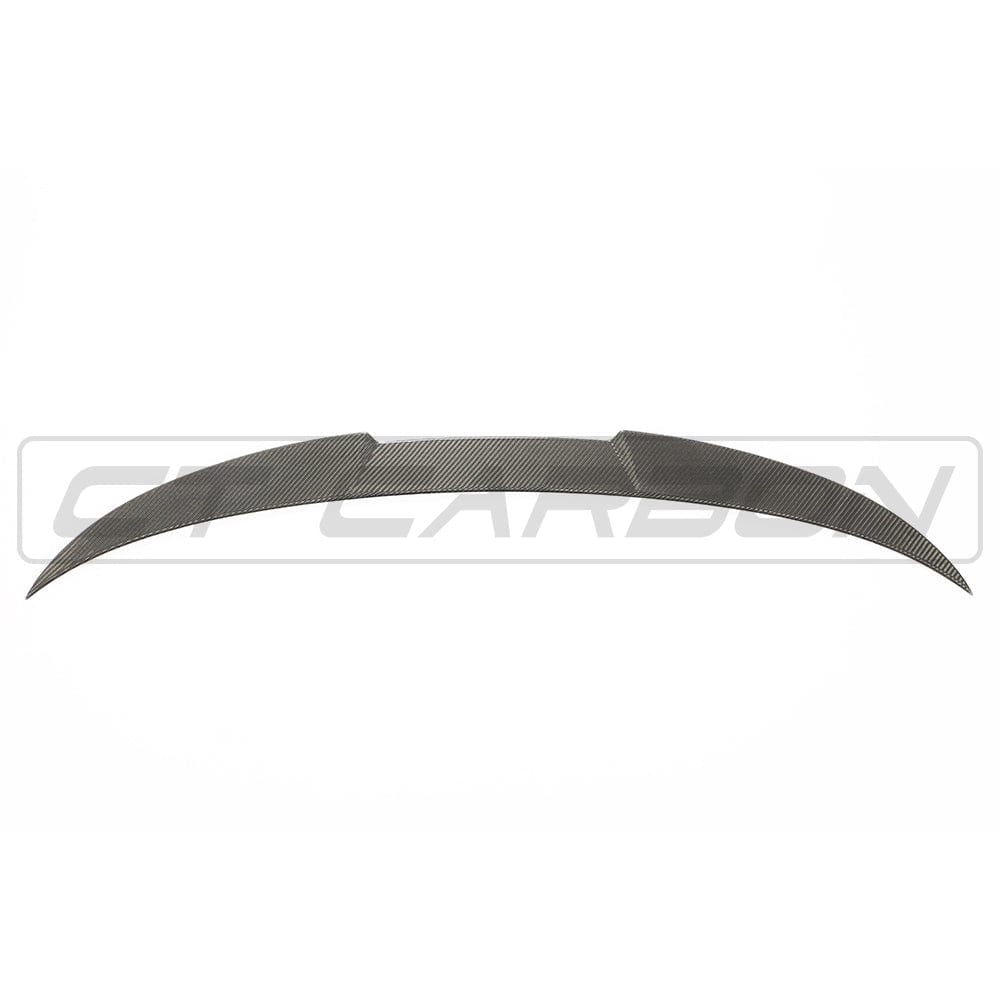 BMW M4 G83 full carbon fiber kit by CT Carbon, featuring MP style components, shown on the car with a focus on the carbon fiber details.