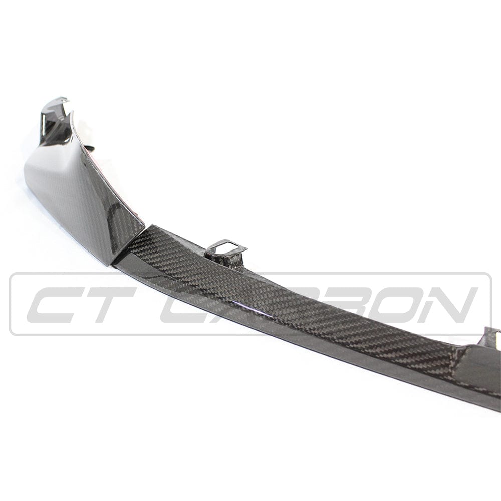 BMW M4 G83 full carbon fibre kit by CT Carbon, showcasing the sleek, lightweight carbon parts on the car's exterior.