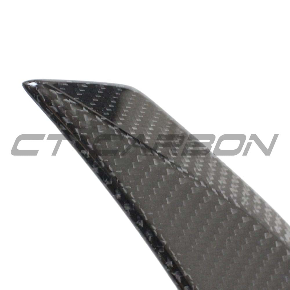 BMW G22 4 Series V6 carbon fibre kit by CT Carbon, featuring a sporty spoiler with a sleek, textured carbon fibre finish.