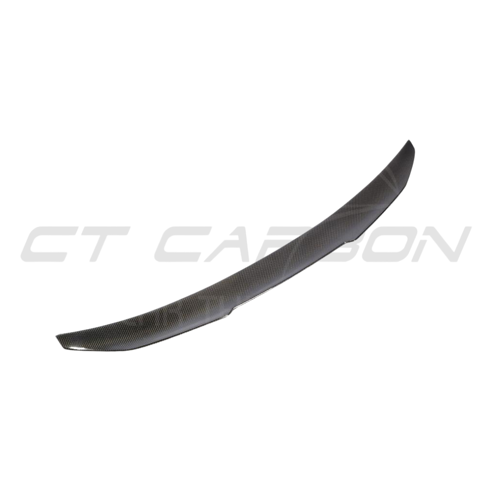 BMW M5 F90 and G30 5 Series carbon fiber spoiler, V1 ducktail style, by CT Carbon, shown on the sleek car exterior.