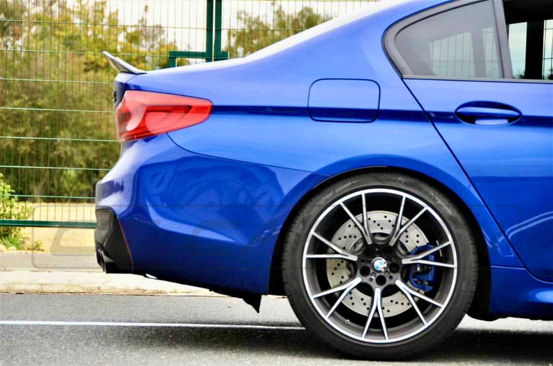 BMW M5 F90 and G30 5 Series carbon fibre spoiler, ducktail style, by CT Carbon, shown mounted on the car's rear.
