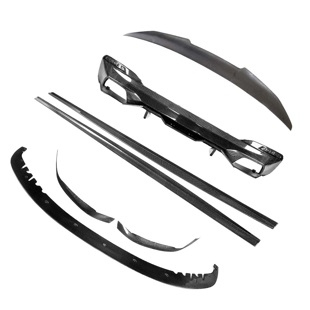 BMW G30 5 Series carbon fibre kit by CT Carbon, including spoiler and ducktail, for a sleek sporty look.