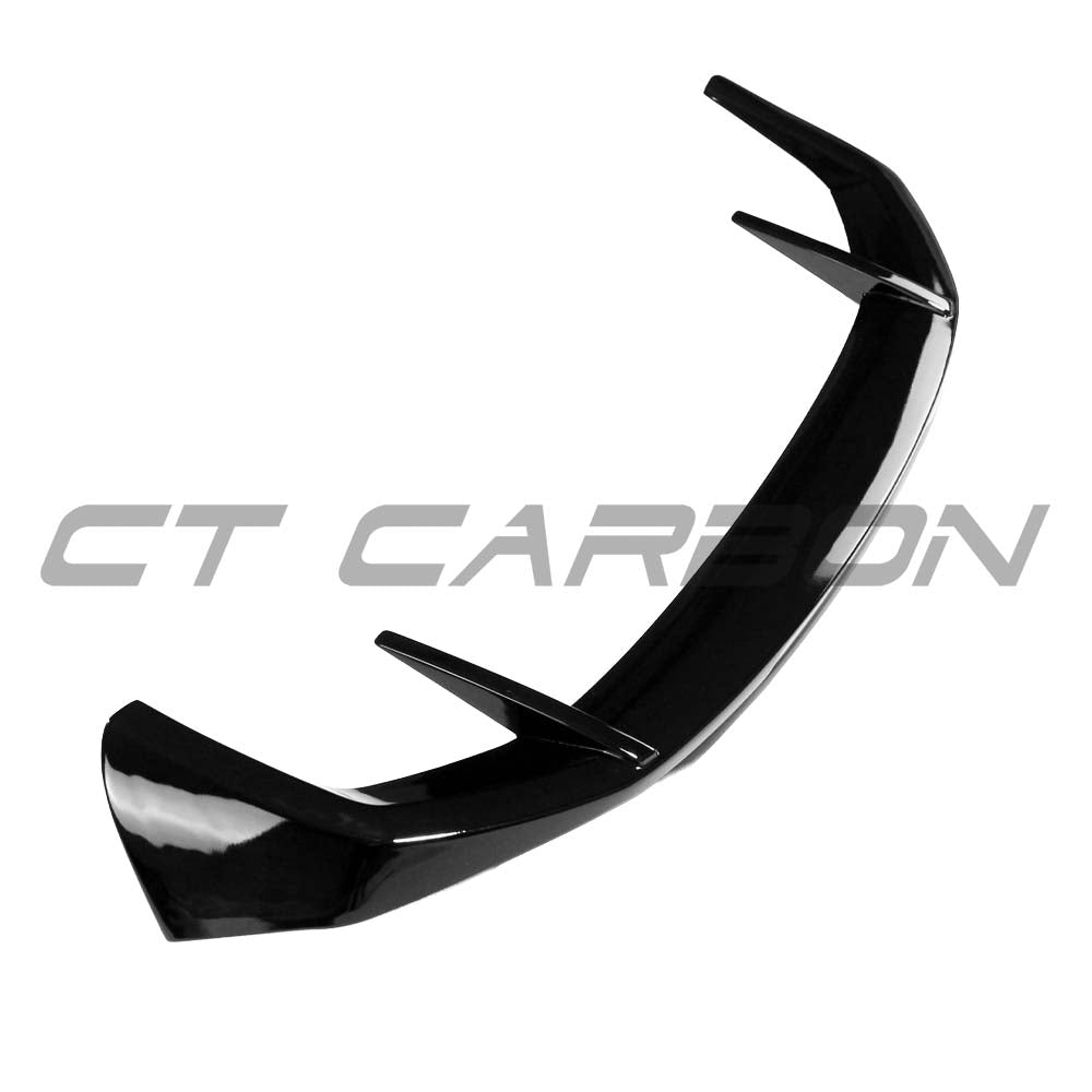 BMW X3 G01 2017+ CT Carbon gloss black spoiler attached to rear trunk, stylish and aerodynamic enhancement for vehicle.