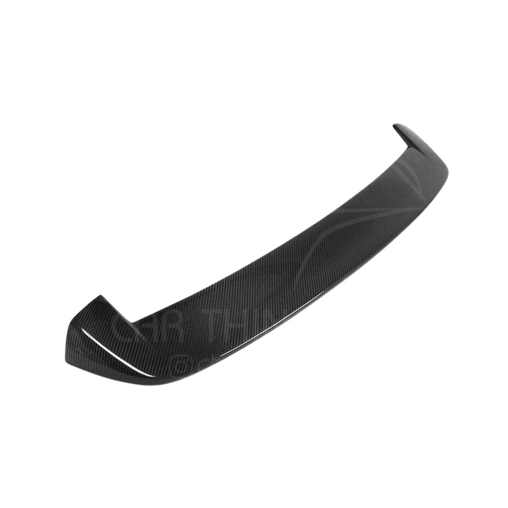 BMW 1 Series F20 M-Sport carbon spoiler by CT Carbon, showcasing sleek carbon fiber design on a sporty vehicle.